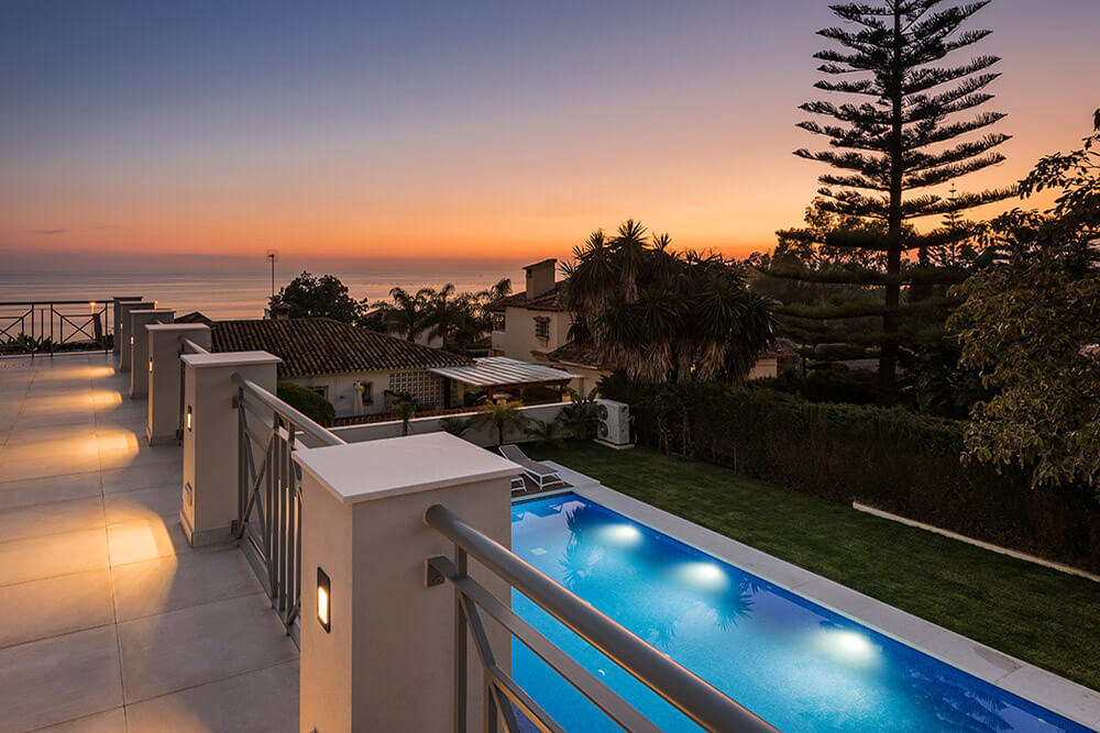 Villa El Real outdoor lighting terrace pool sunset