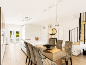 Contemporary kitchen and dinning with drop lights and kitchen island
