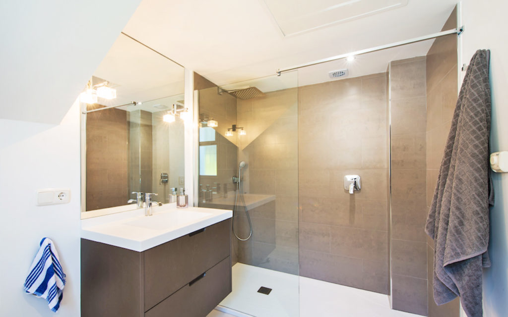 Modern brown beige toned bathroom in Marbella