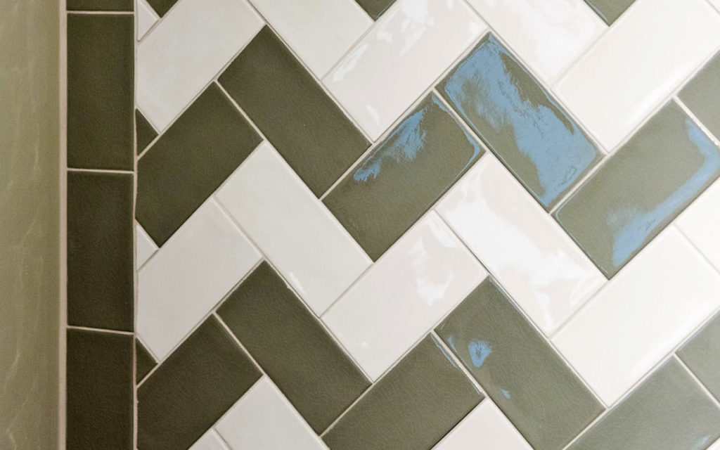 Grey and white herringbone tiles in bathroom in Marbella, Costa del Sol