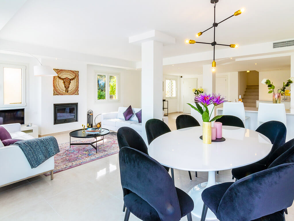 Contemporary Stylish white and blue and purple dinning and living area in Marbella