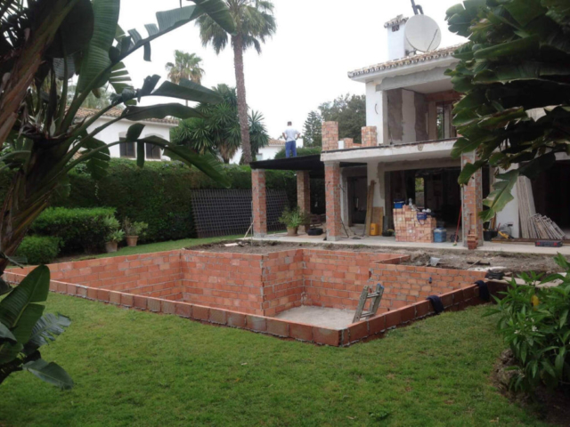 Garden pool villa with brick pillars