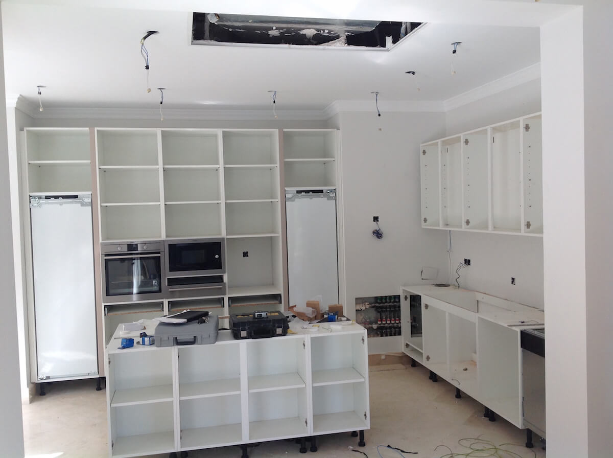 Kitchen units being fitted