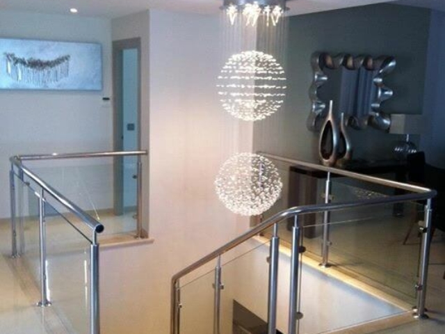 Chandelier over staircase