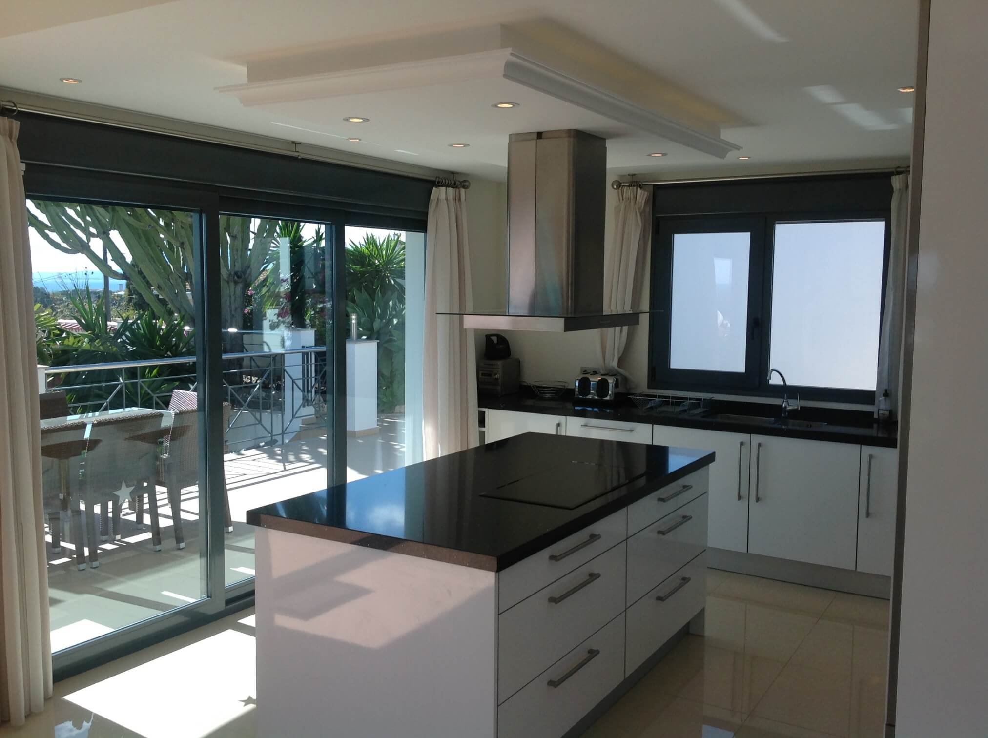 Kitchen with bi-folding doors and island