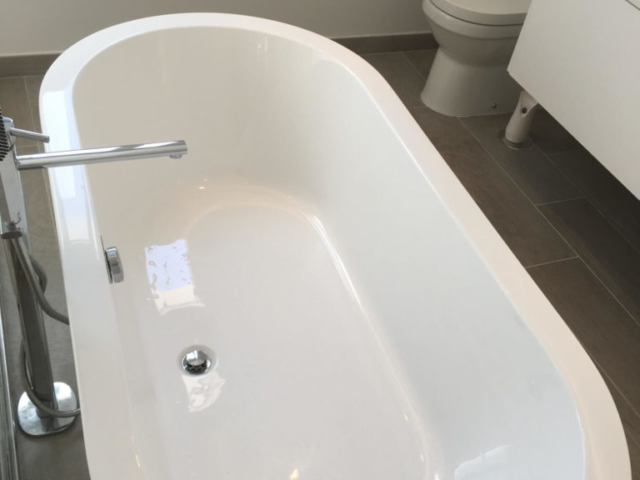 Bathroom with white bath tub