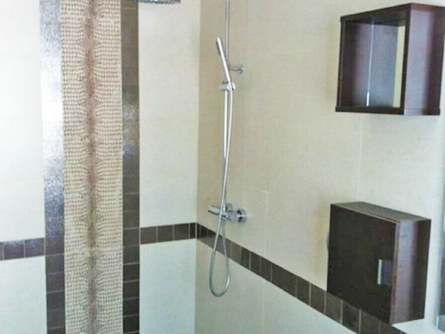 Box storage solutions in shower room
