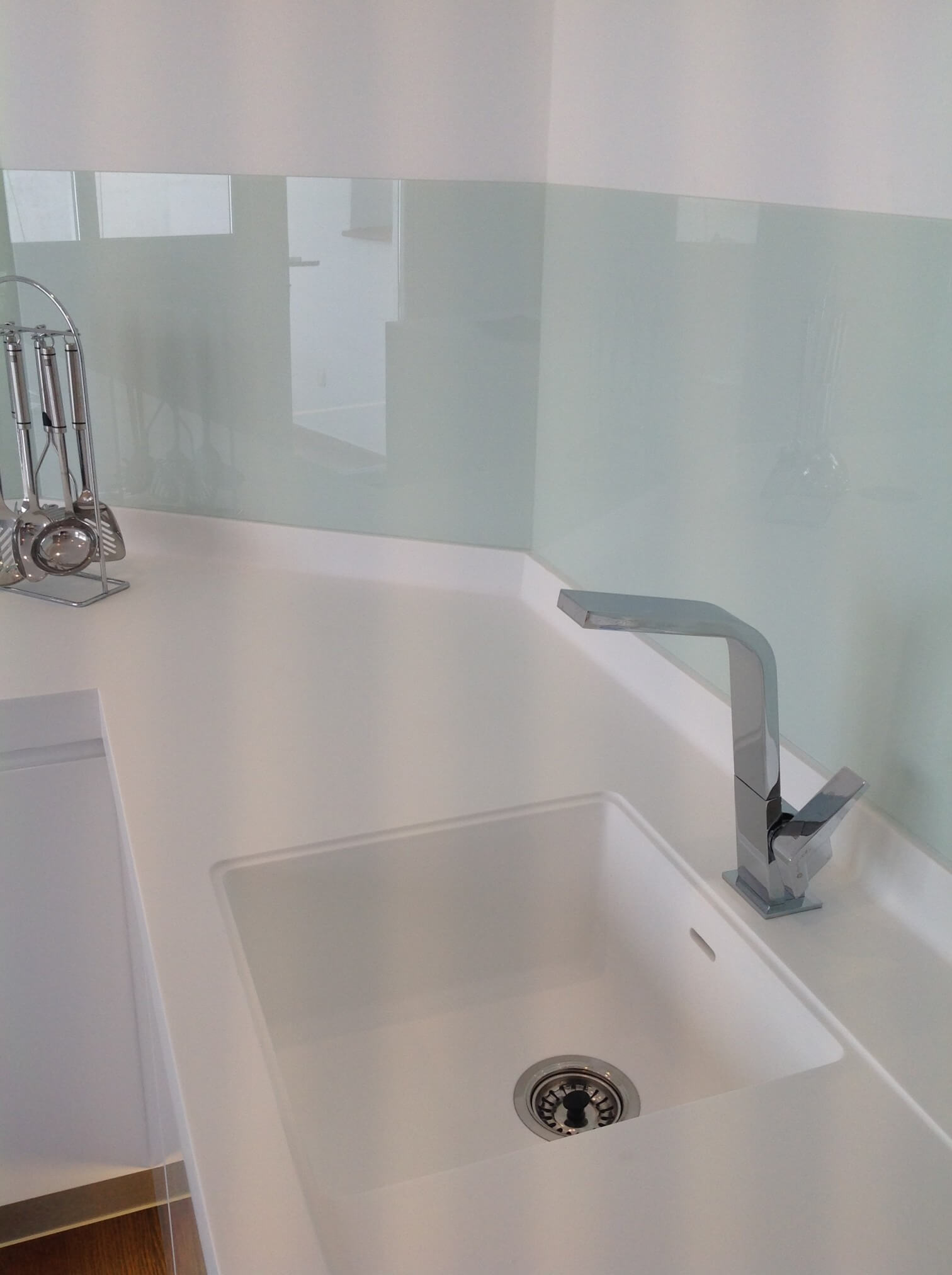 Sink with glass splashback