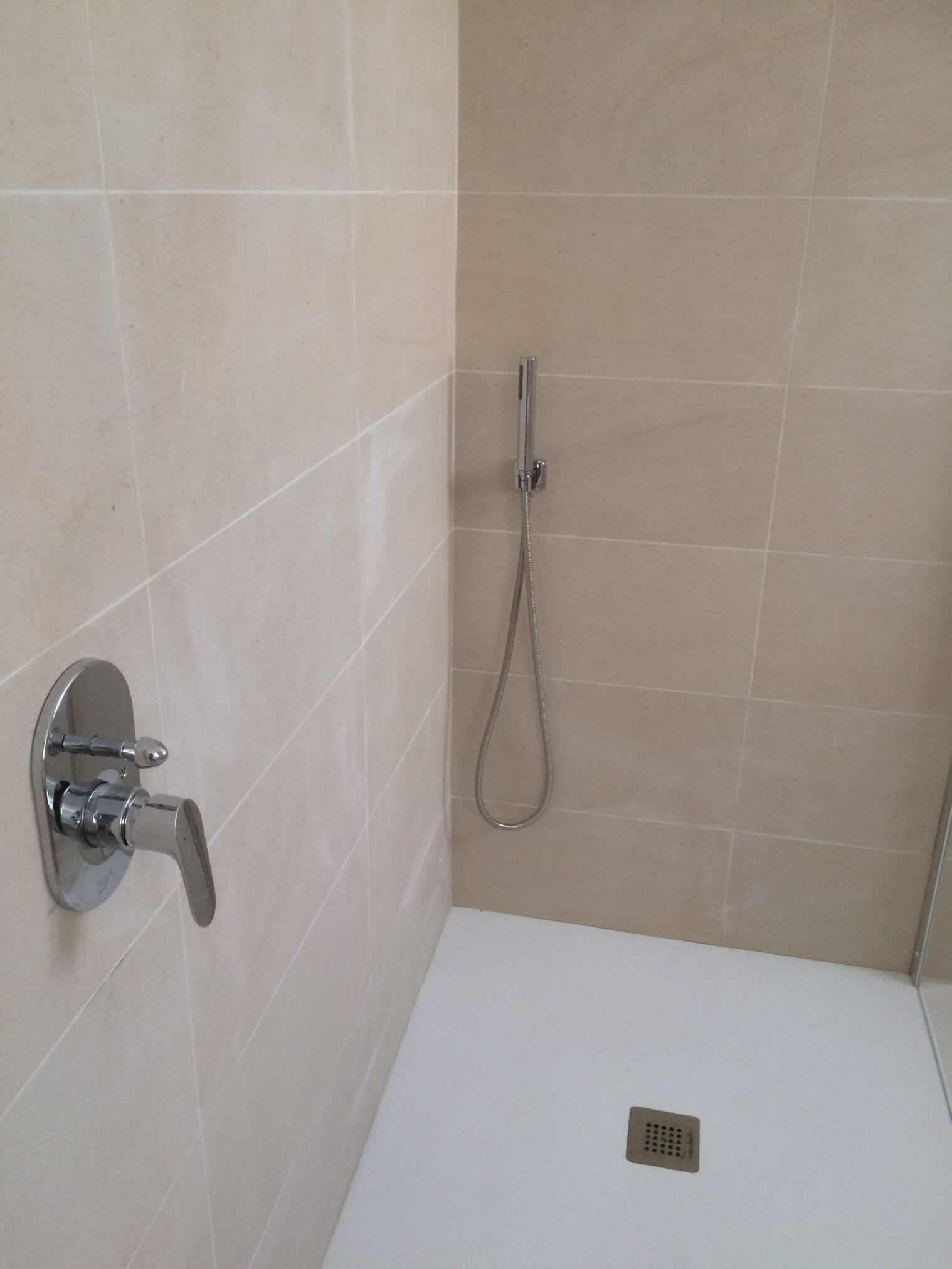Shower drain and controls