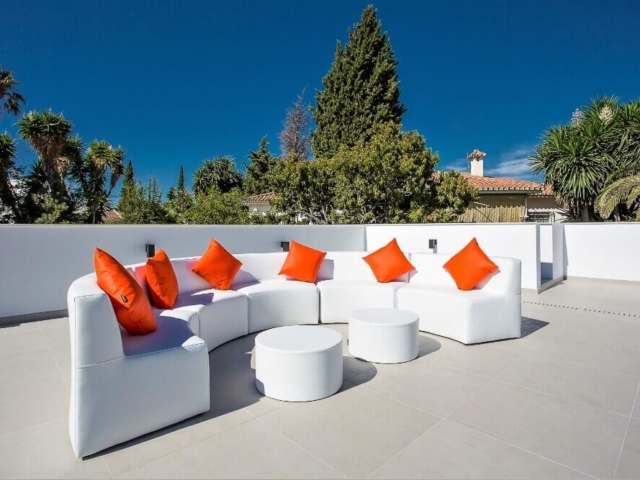 Refurnished rooftop with white leather curved sofa by ProMas in Puerto Banus
