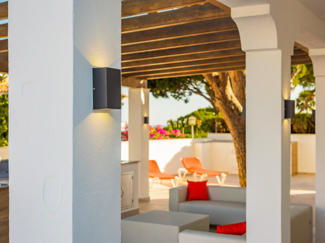 Looking through Spanish columns to modern chillout area in Costa del Sol