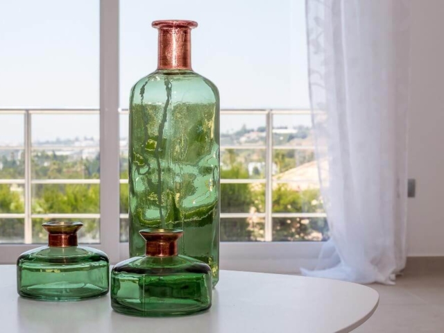 Green bottle interior design details by ProMas in Marbella