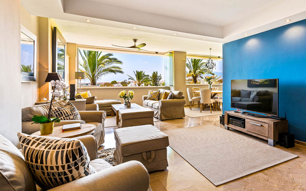 Contemporary living room with feature wall in Marbella