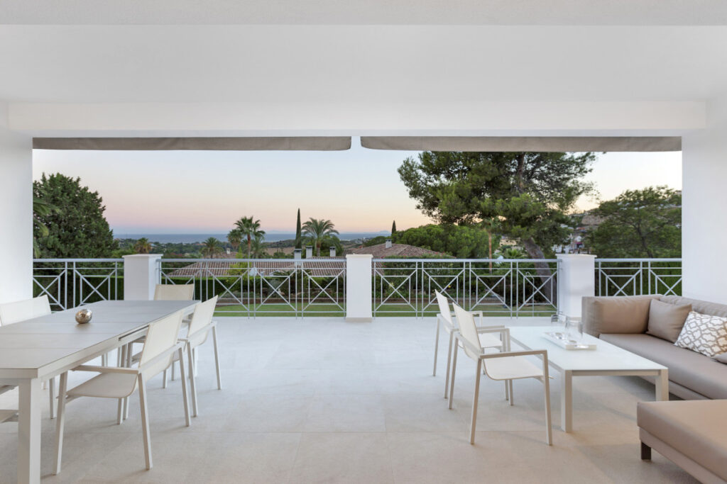 Stylish dinning and chillout area on balcony in Marbella