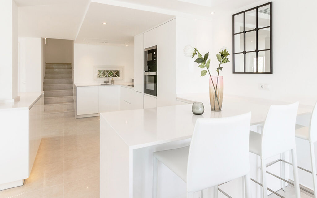 Stylish white kitchen in Buenavista, Marbella designed and built by ProMas