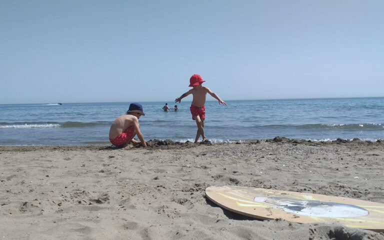 Children playing on Elviria beach in Marbella, Costa del Sol