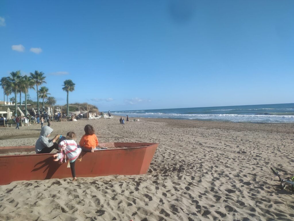 Children hanging out at Elviria beach