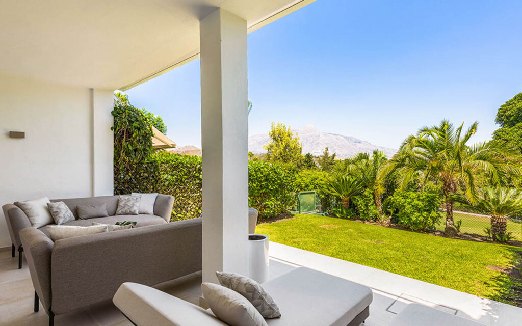 Grey outdoor furniture chill out area on porch