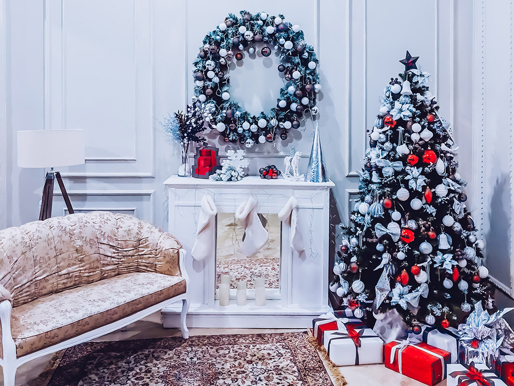 Traditional red and white christmas tree and fireplace living room