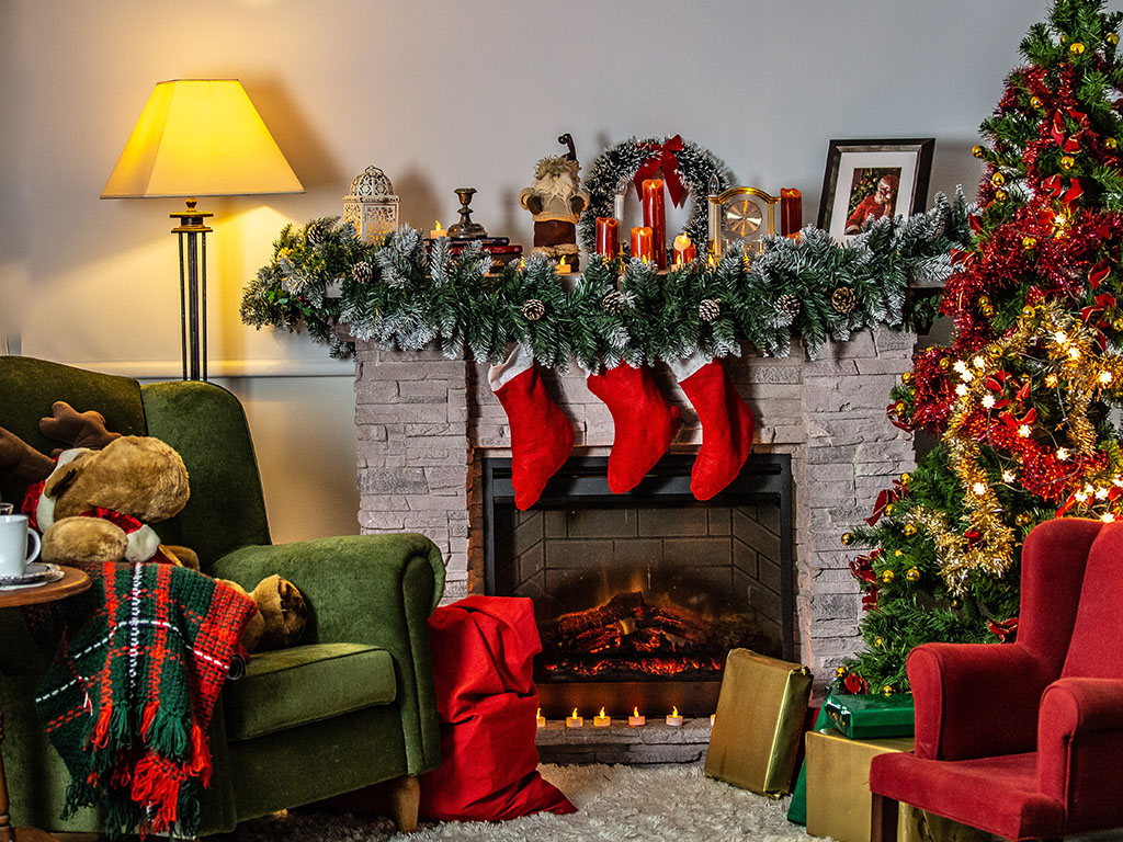 Traditional red and green Christmas tree with fireplace