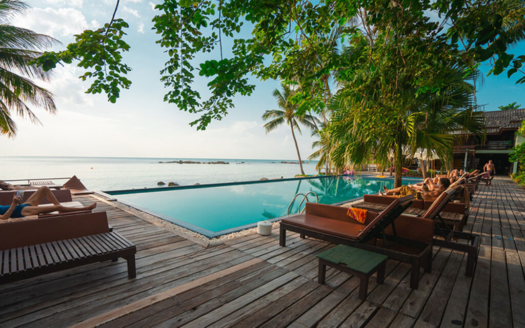 Pool with deck by the sea