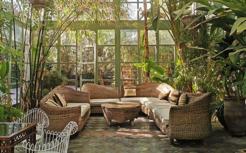 English greenhouse with rattan couches