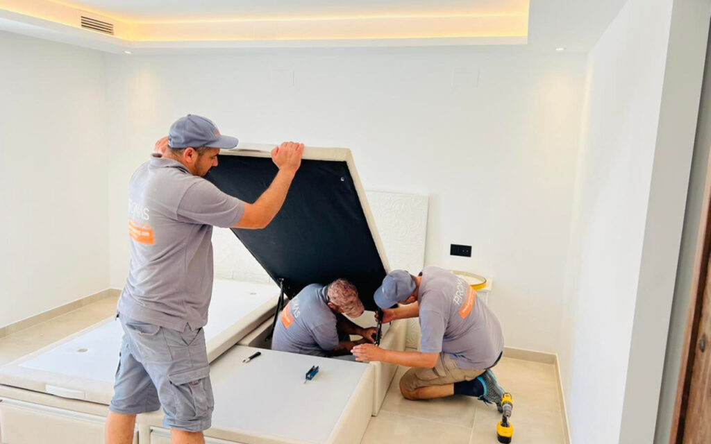 Promas team mounting carefully selected furniture getting the house ready to move in
