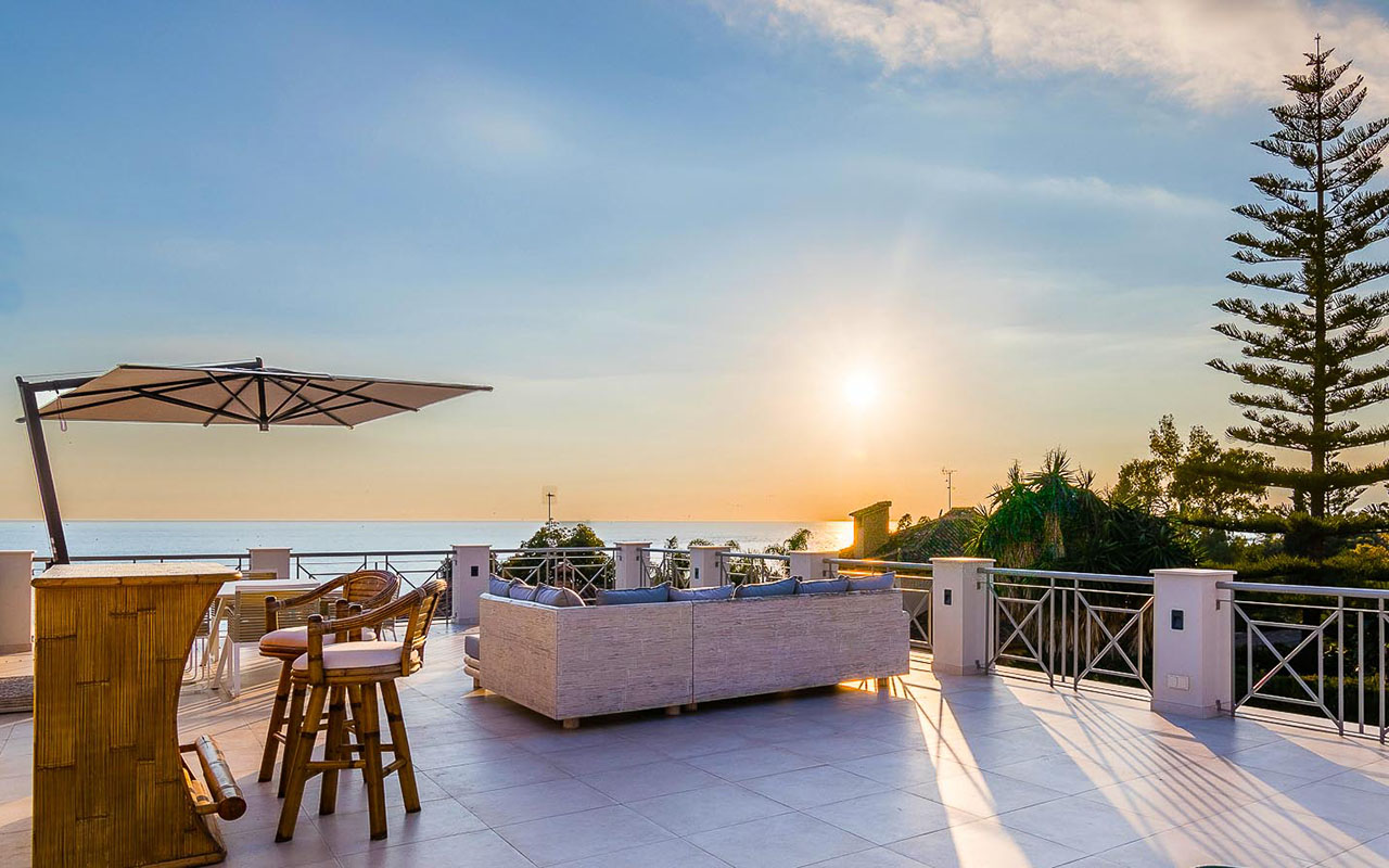 Stunning rooftop with sea views at sunset