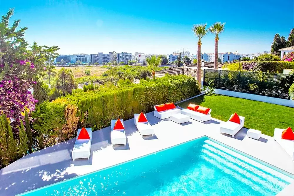 stylish pool relax zone sunlounges view in puerto banus marbella