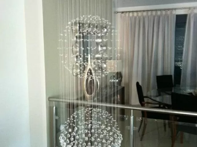 Chandelier over staircase close up