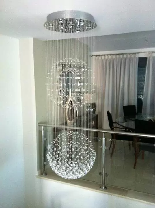 Chandelier over staircase close up
