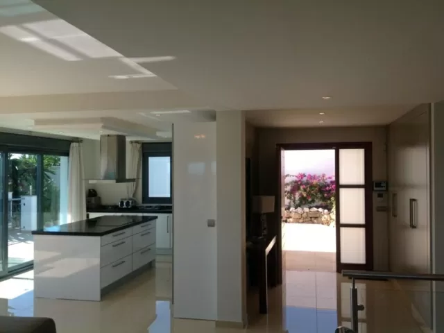Kitchen leading out to the front